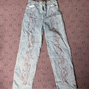 Le Lis Light Blue Denim Highwaisted Pants with Fire Embroidered Down the Legs.